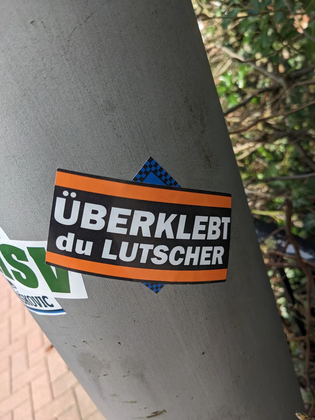 Aufkleber Überklebt Lutscher